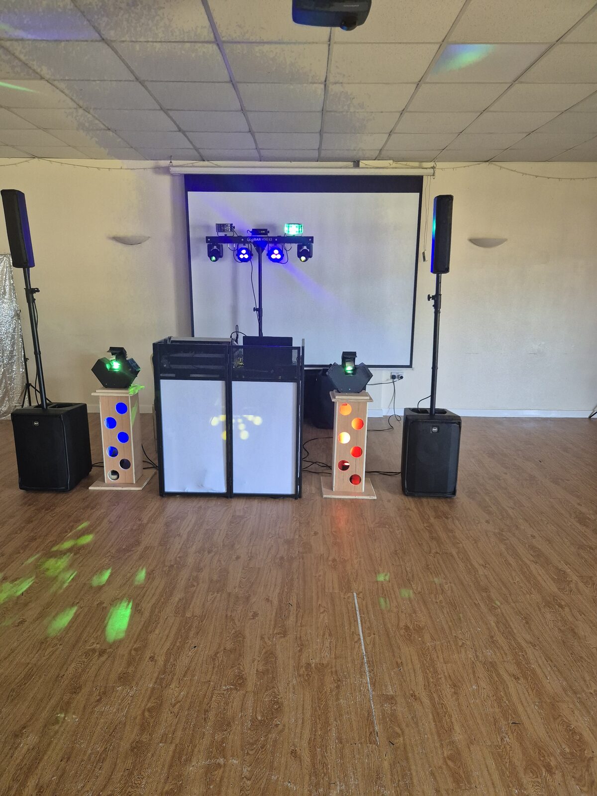 Ace Entertainment professional DJ booth with column speakers, lighting and dancefloor setup